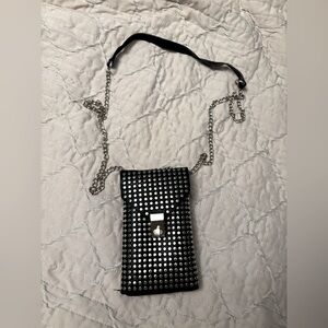 Small vegan leather, can fit an iPhone